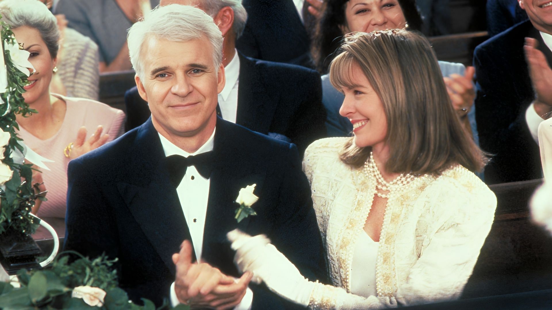 George Banks (Steve Martin) sits beside Nina Banks (Diane Keaton) at the wedding in Father of the Bride, showcasing a key family moment (Image via Disney+)